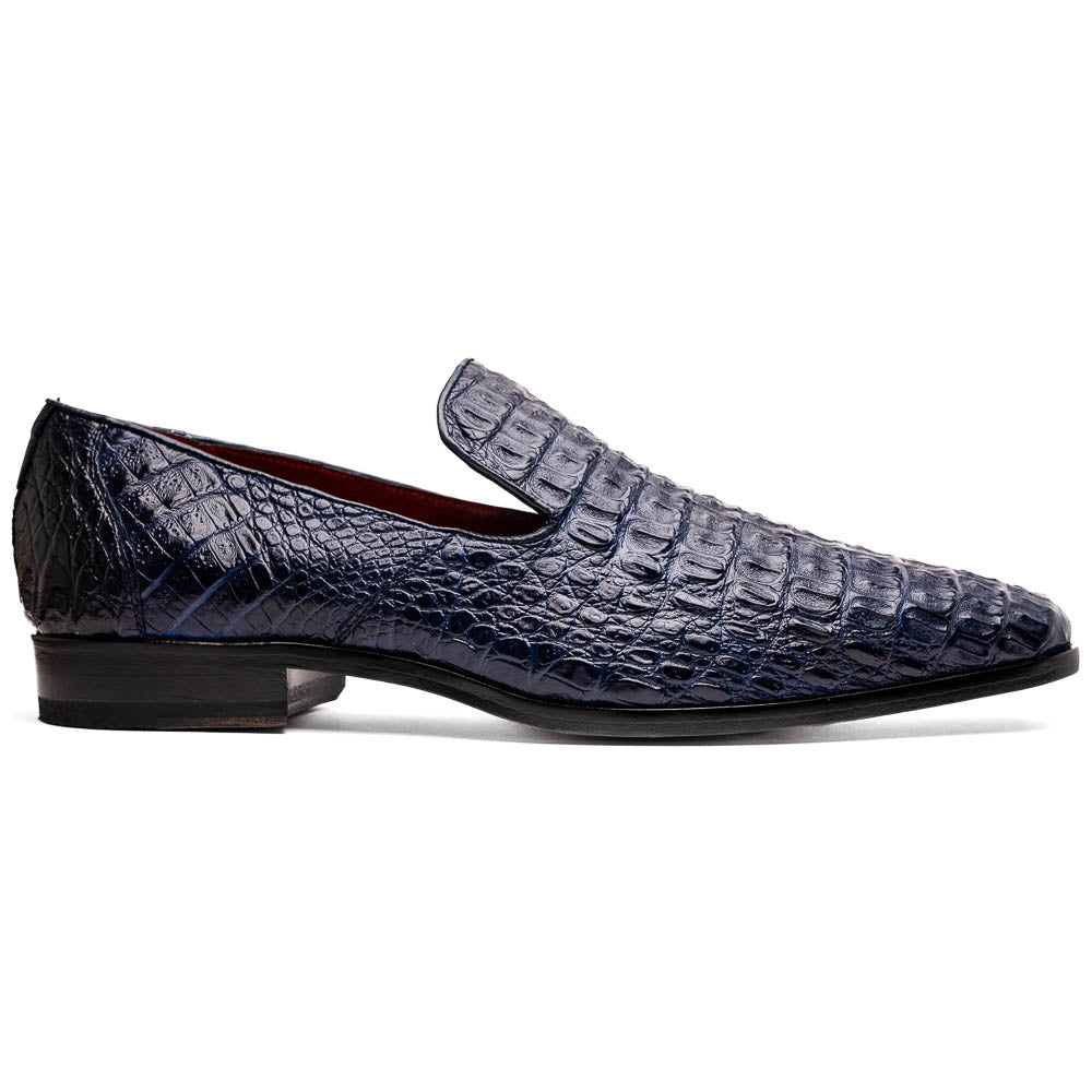The Trento Navy by Marco Di Milano are dark blue genuine caiman leather loafers featuring hand-painted finishes, red lining, and "Marco Di Milano" branding on the sole.