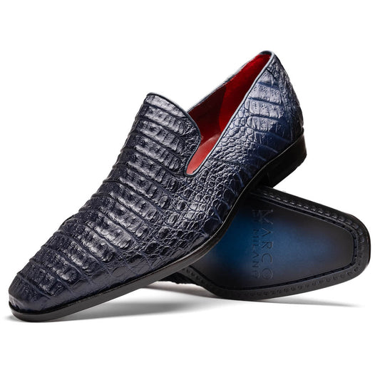 The Trento Navy by Marco Di Milano are dark blue genuine caiman leather loafers featuring hand-painted finishes, red lining, and "Marco Di Milano" branding on the sole.