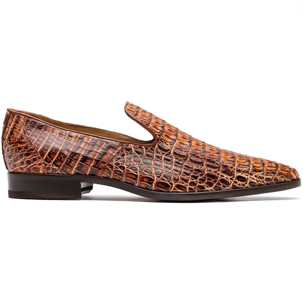 The Marco Di Milano Trento Rustic Cognac shoes, crafted from genuine caiman crocodile leather with a hand-painted finish, are displayed—one upright and one showing the sole—to highlight this luxurious footwear’s exquisite design.