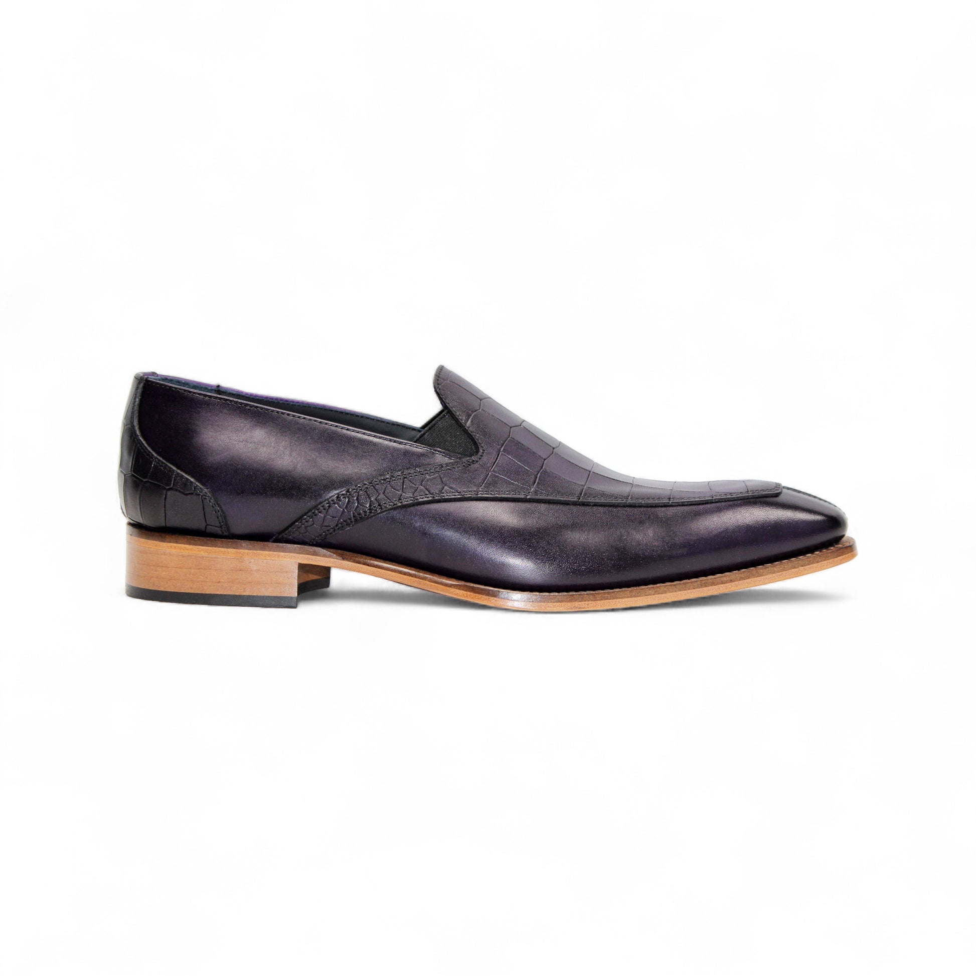 The Duca Di Matiste Duca Trento Purple is a stylish purple leather loafer with croco embossing and a light brown wooden sole, displayed in side profile against a white background.
