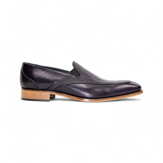 The Duca Di Matiste Duca Trento Purple is a stylish purple leather loafer with croco embossing and a light brown wooden sole, displayed in side profile against a white background.