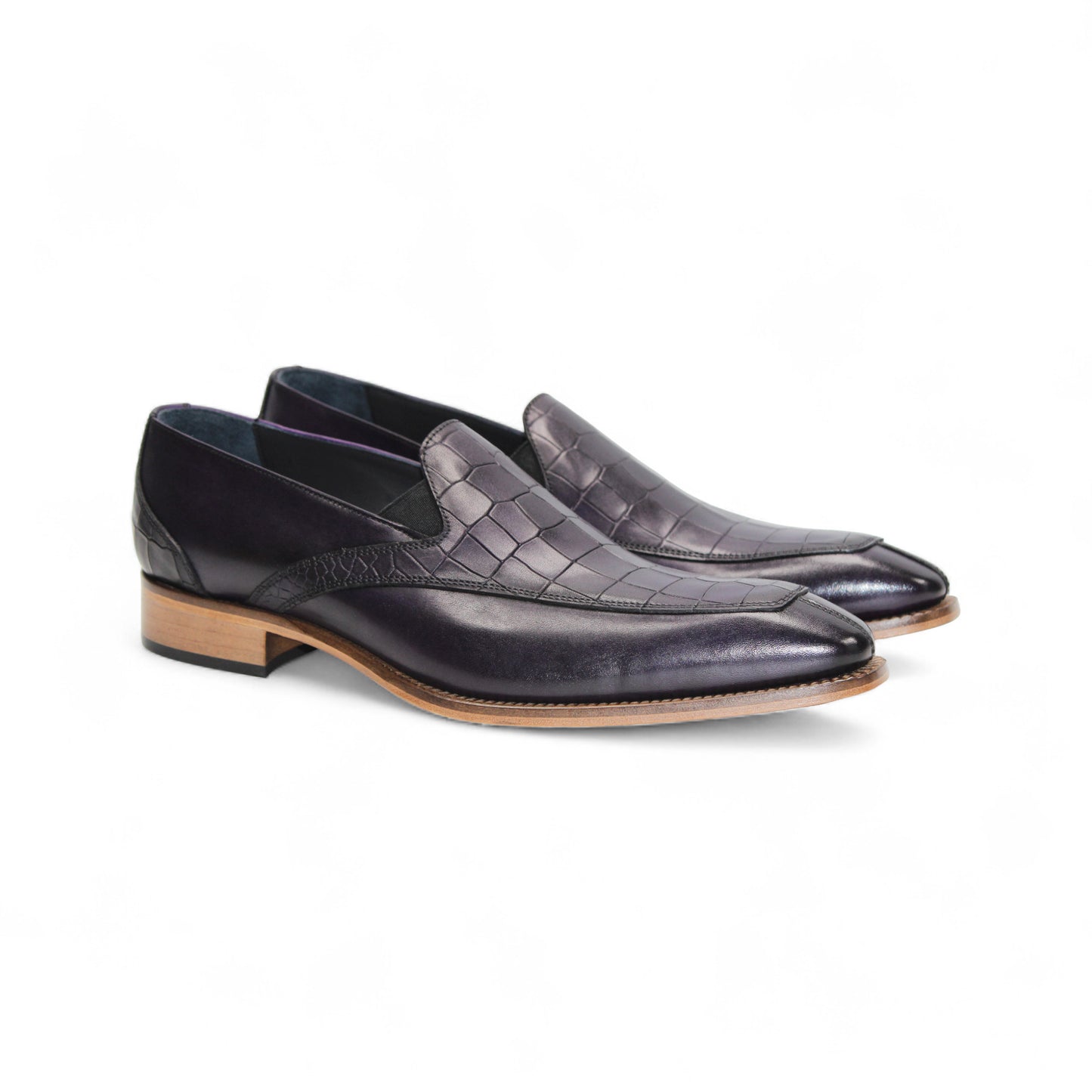 The Duca Di Matiste Duca Trento Purple is a stylish purple leather loafer with croco embossing and a light brown wooden sole, displayed in side profile against a white background.