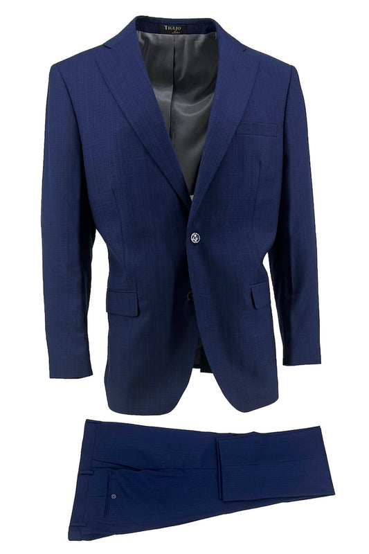 The Tiglio Luxe New Blue Micro-Design Novello TL2550 is a modern fit men’s suit in pure wool, featuring a single-breasted jacket and matching trousers, shown against a white background.