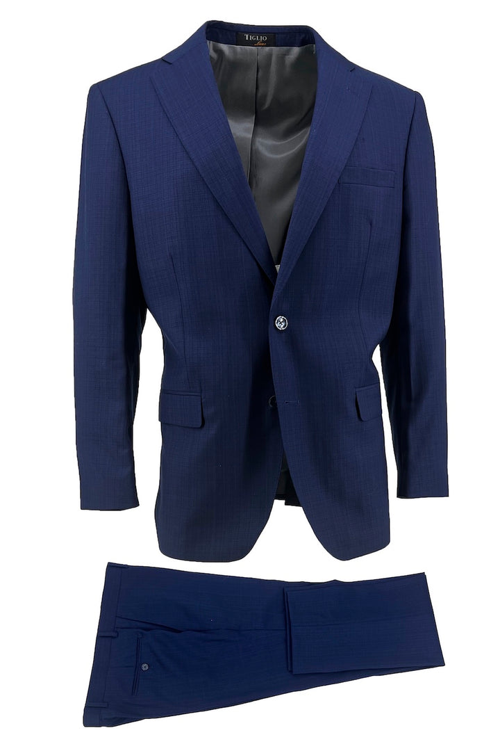 The Tiglio Luxe New Blue Micro-Design Porto Slim Fit Pure Wool Suit TL2550 is a men's two-piece suit with a single-breasted jacket and matching trousers, shown on a white background.