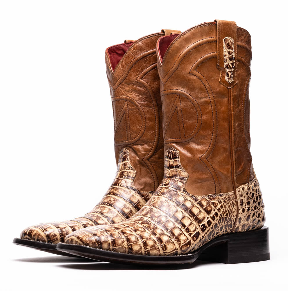 The Marco Di Milano Tucson Stone Orix boots feature genuine caiman belly with brown leather uppers and a crocodile pattern lower, shown from the side and sole.