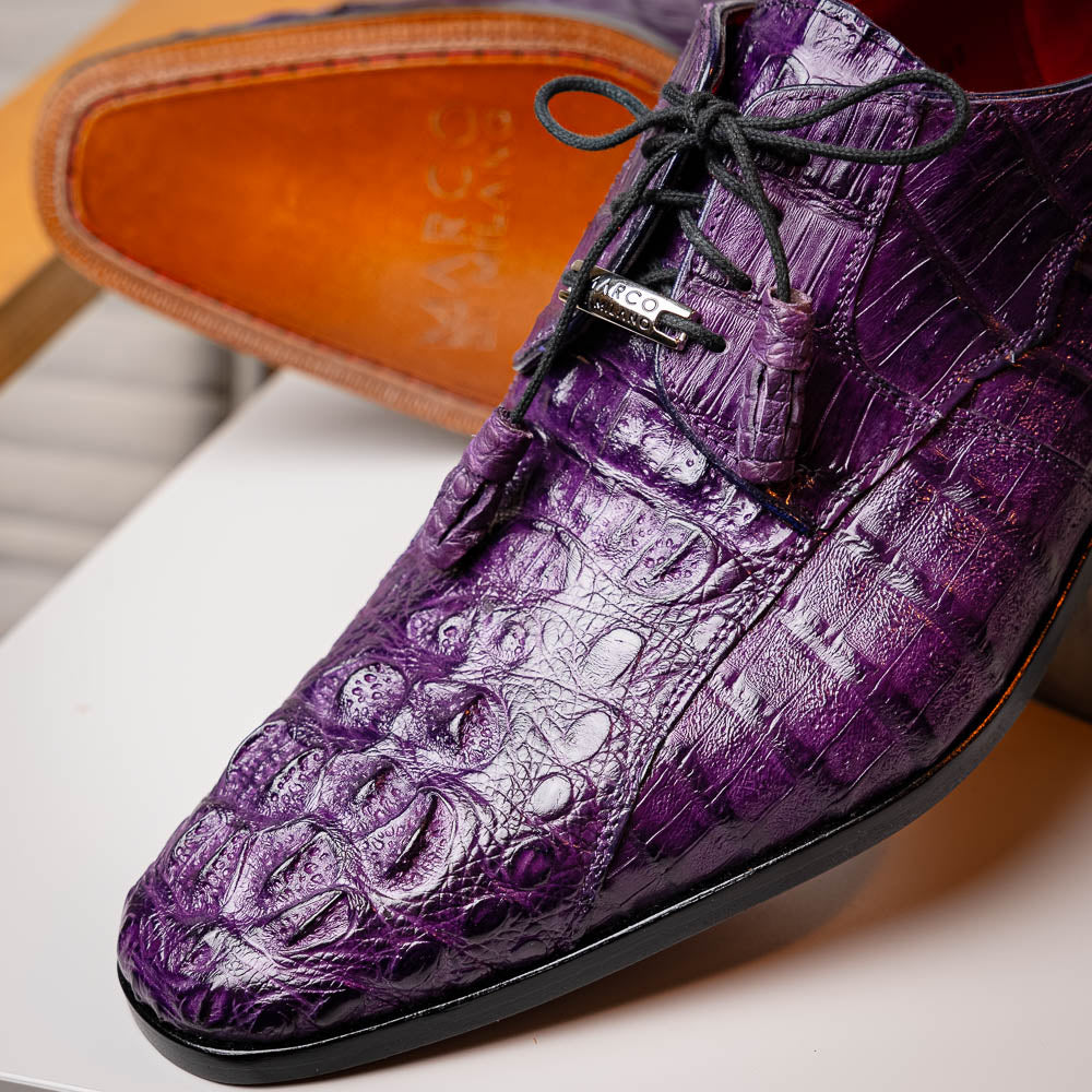 A pair of luxury Marco Di Milano Tulum Purple derby shoes crafted from genuine caiman leather, one upright and one showing the tan sole with "Marco Di Milano" branding.