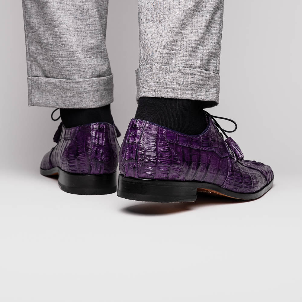 A pair of luxury Marco Di Milano Tulum Purple derby shoes crafted from genuine caiman leather, one upright and one showing the tan sole with "Marco Di Milano" branding.
