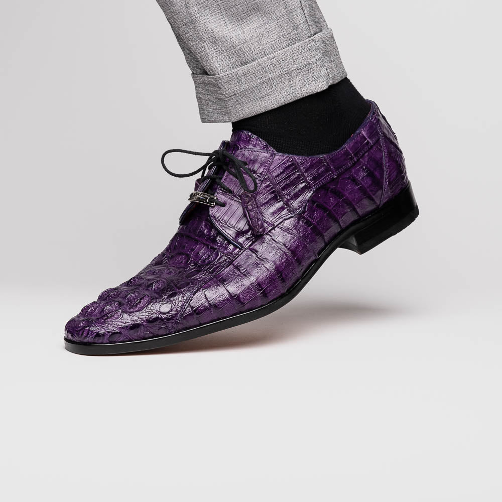 A pair of luxury Marco Di Milano Tulum Purple derby shoes crafted from genuine caiman leather, one upright and one showing the tan sole with "Marco Di Milano" branding.