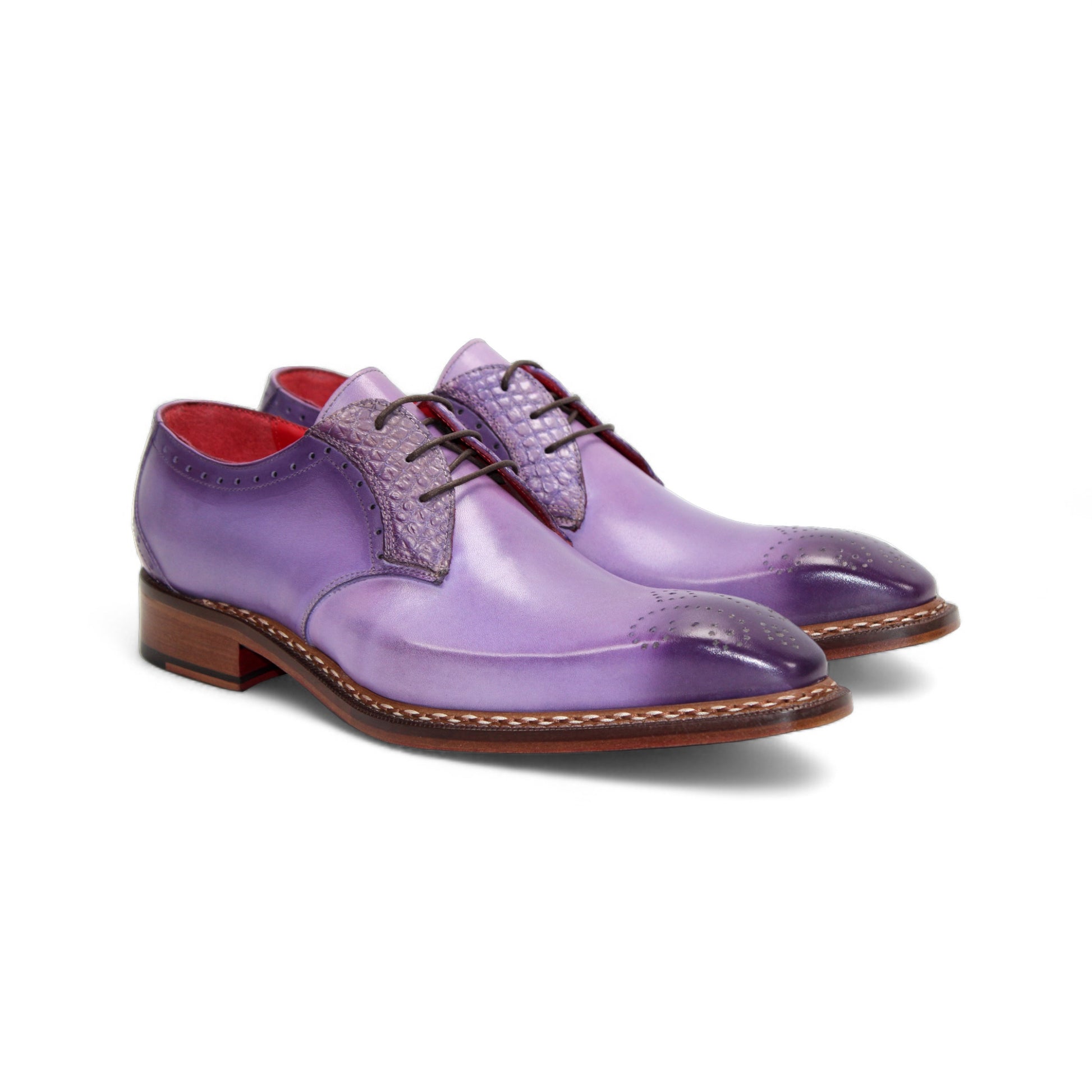 The Fennix of Italy Fennix Tyler Lavender is a single purple leather dress shoe with brogue detailing, Italian craftsmanship, red inner lining, and a brown leather sole, shown on a white background.