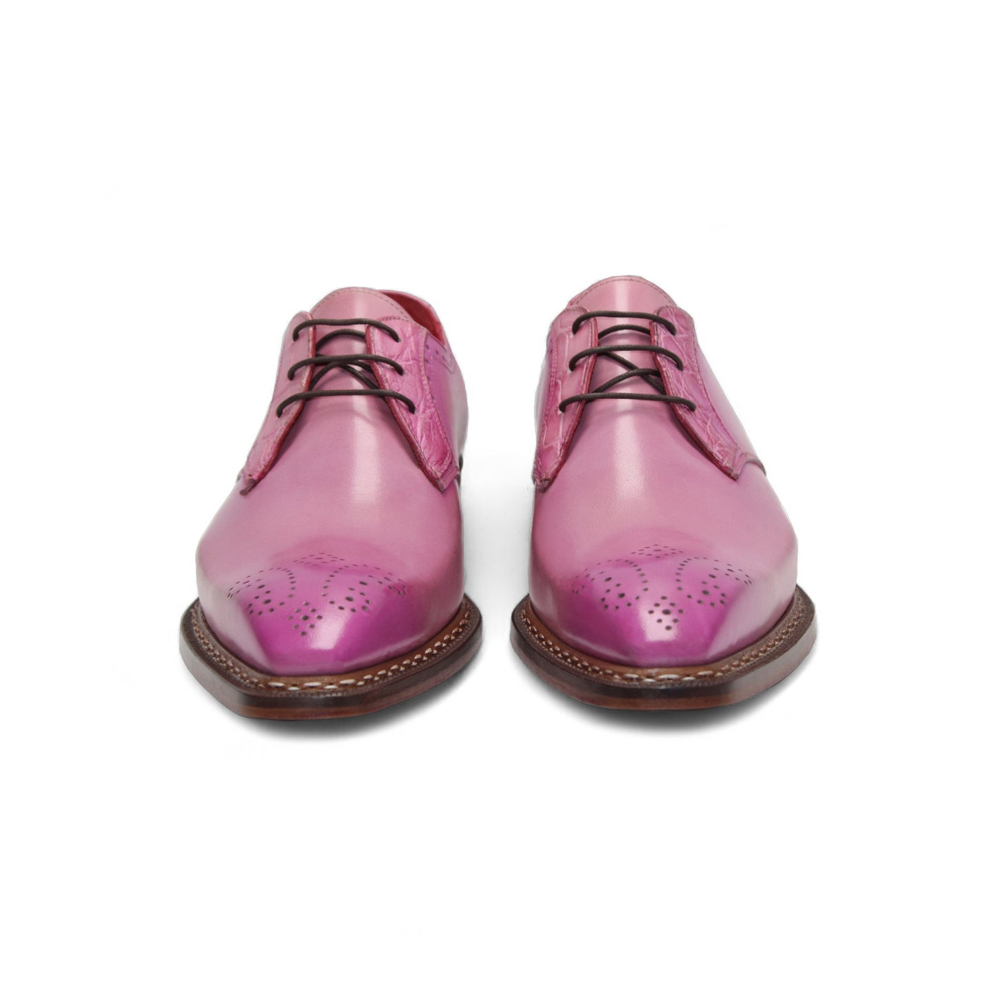 The Fennix Tyler Pink by Fennix of Italy is a pink leather oxford dress shoe with brogue detailing, leather sole, and laces, showcasing Italian craftsmanship on a white background.