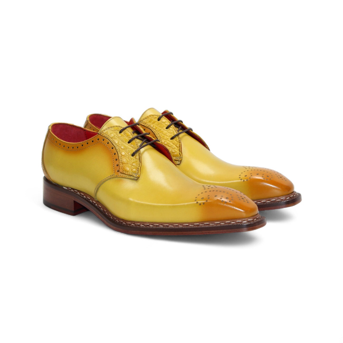 The Fennix Tyler Yellow by Fennix of Italy is a yellow leather oxford dress shoe with brown detailing, red laces, a low wooden heel, and a premium leather sole, photographed on a white background.