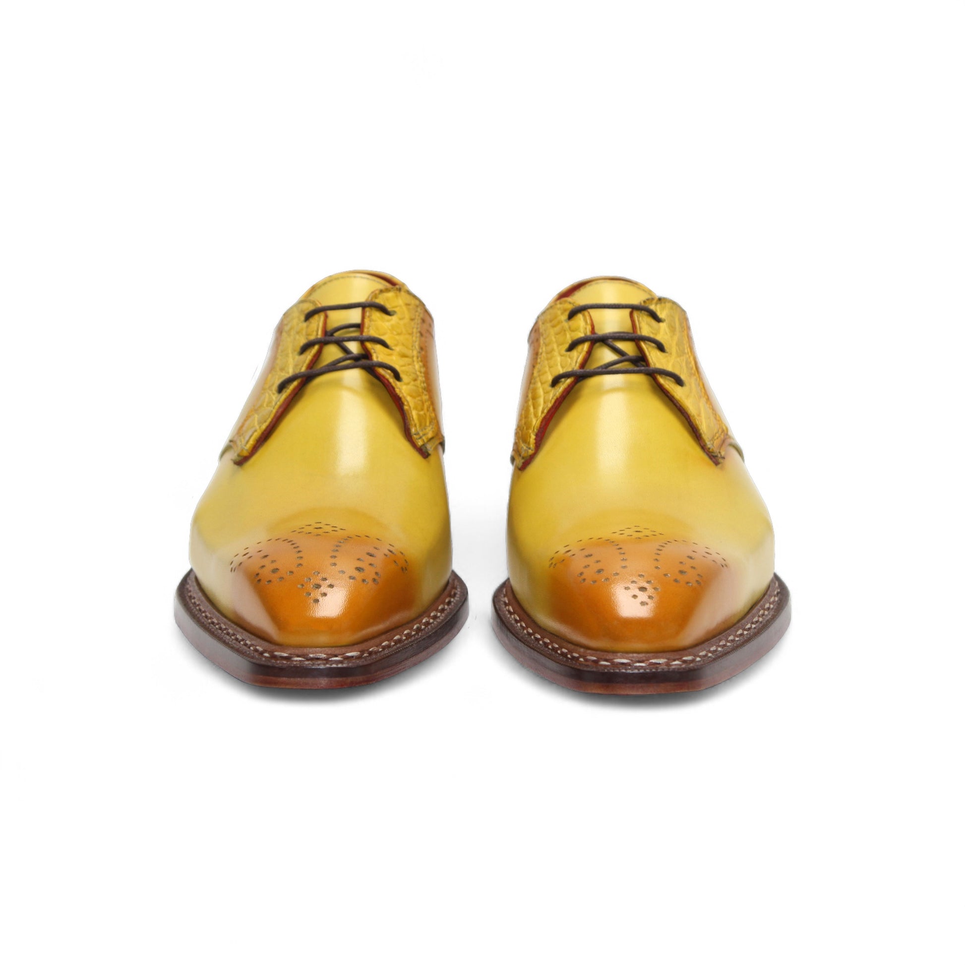 The Fennix Tyler Yellow by Fennix of Italy is a yellow leather oxford dress shoe with brown detailing, red laces, a low wooden heel, and a premium leather sole, photographed on a white background.