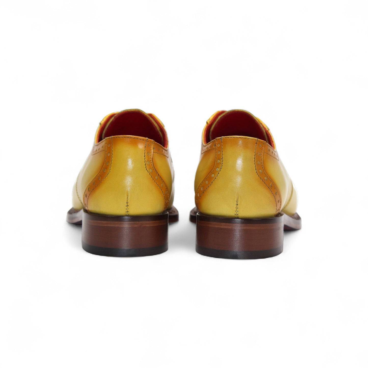 The Fennix Tyler Yellow by Fennix of Italy is a yellow leather oxford dress shoe with brown detailing, red laces, a low wooden heel, and a premium leather sole, photographed on a white background.