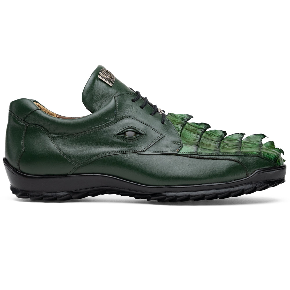 Introducing the Udine Green by Marco Di Milano: luxury men’s shoes in dark green, crafted from exotic hornback caiman leather. These dress shoes showcase a textured, scale-like front design, black laces, and decorative metal initials on the tongue—all displayed against a white background.