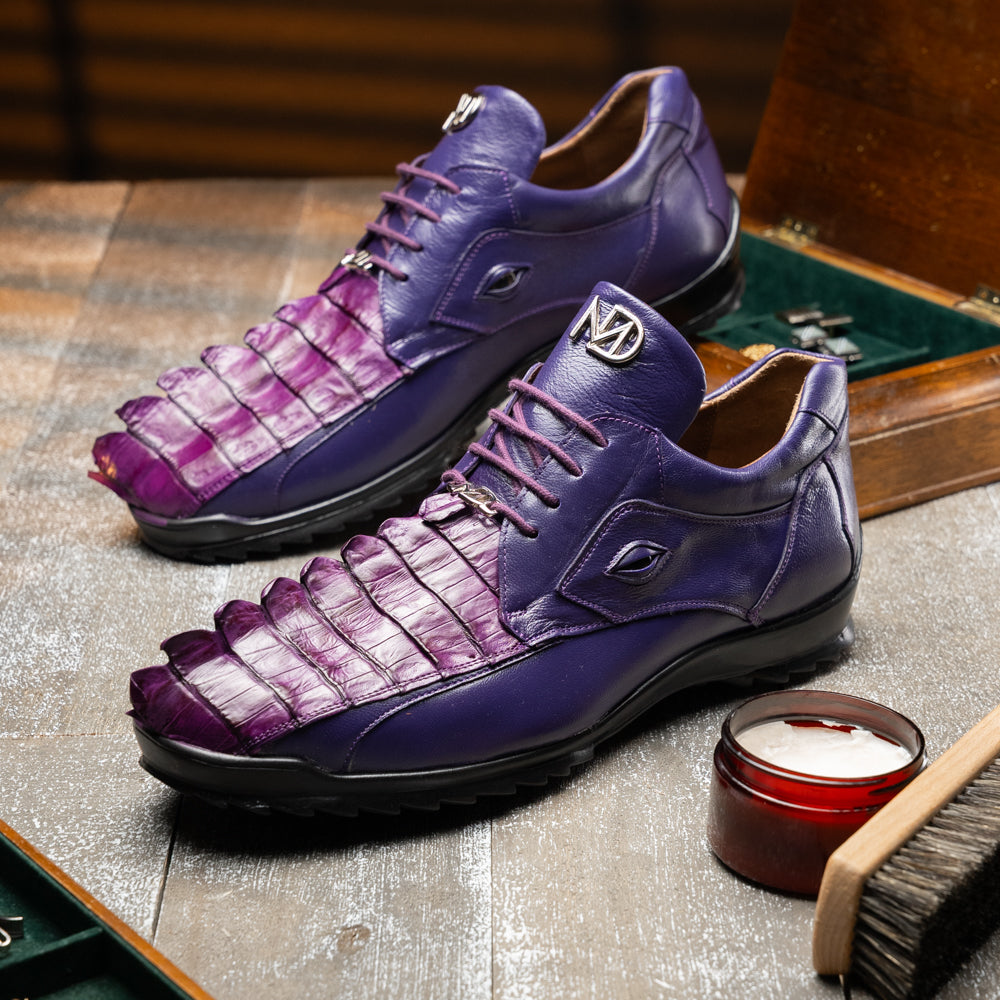 Introducing Udine Purple by Marco Di Milano, these luxury men’s leather dress shoes feature a striking purple hue with a distinctive textured ribbed front design and sturdy black rubber soles, seamlessly blending classic elegance with modern style.