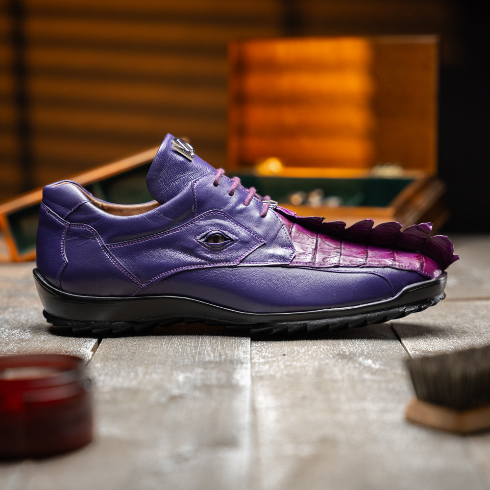 Introducing Udine Purple by Marco Di Milano, these luxury men’s leather dress shoes feature a striking purple hue with a distinctive textured ribbed front design and sturdy black rubber soles, seamlessly blending classic elegance with modern style.
