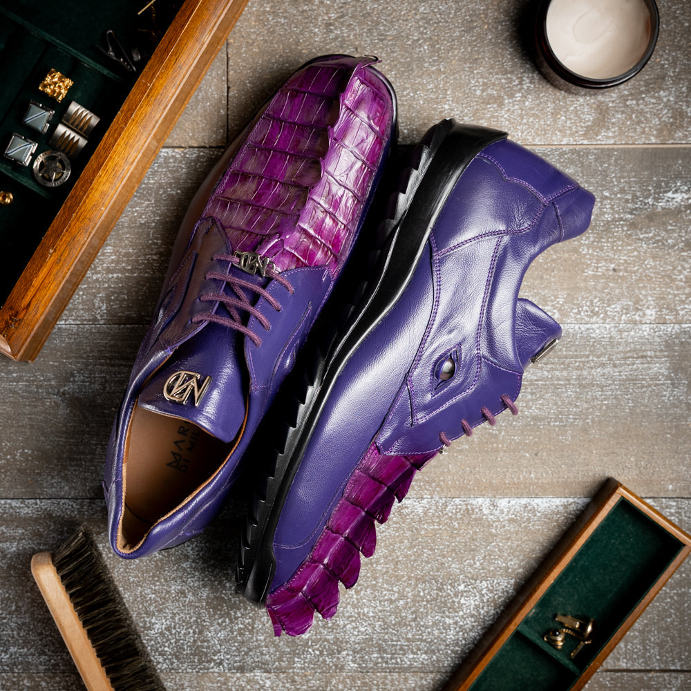 Introducing Udine Purple by Marco Di Milano, these luxury men’s leather dress shoes feature a striking purple hue with a distinctive textured ribbed front design and sturdy black rubber soles, seamlessly blending classic elegance with modern style.