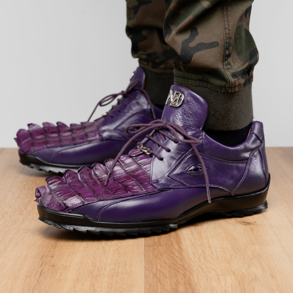Introducing Udine Purple by Marco Di Milano, these luxury men’s leather dress shoes feature a striking purple hue with a distinctive textured ribbed front design and sturdy black rubber soles, seamlessly blending classic elegance with modern style.