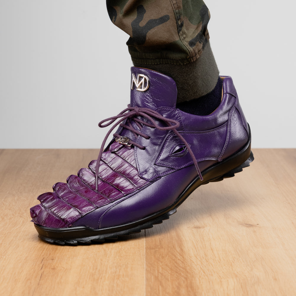 Introducing Udine Purple by Marco Di Milano, these luxury men’s leather dress shoes feature a striking purple hue with a distinctive textured ribbed front design and sturdy black rubber soles, seamlessly blending classic elegance with modern style.