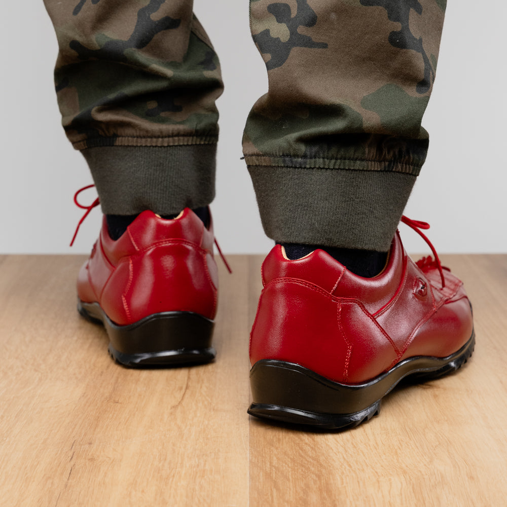 A pair of Marco Di Milano Udine Red glossy hornback caiman sneakers with lace-up fronts, featuring textured detailing and black rubber soles, one luxury men’s sneaker resting elegantly on the other.