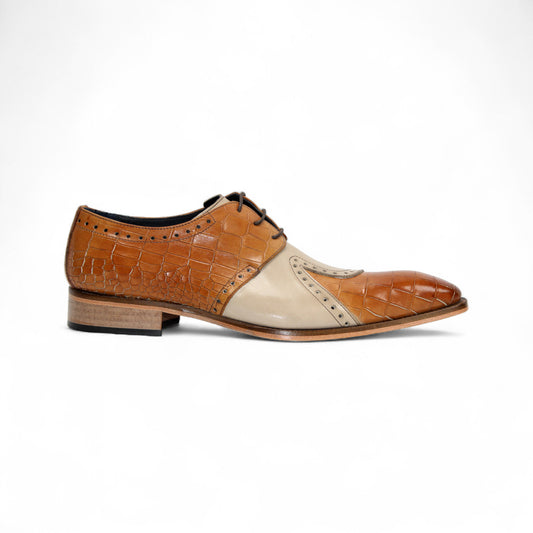 The Duca Di Matiste Valentano dress shoe, in cognac and beige croco leather with a lace-up closure and low wooden heel, is made in Italy by Duca Di Matiste and shown in a side view against a white background.