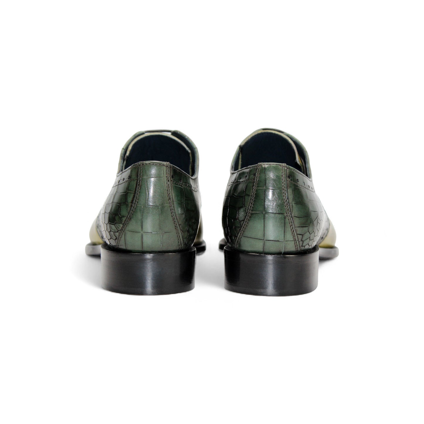 The Duca Di Matiste Duca Valentano Green/Olive is a men's dress shoe with a green and yellow croco-embossed genuine leather upper and low black heel for a textured, stylish look.