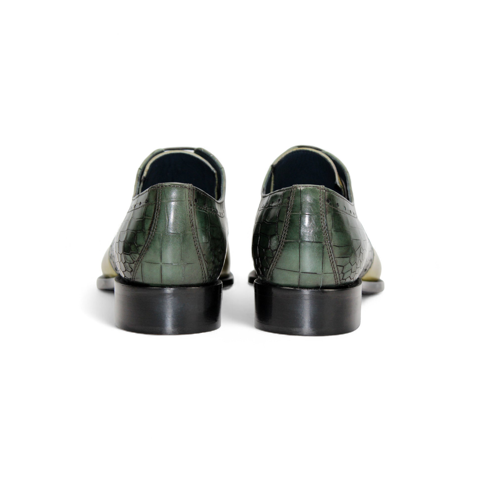 The Duca Di Matiste Duca Valentano Green/Olive is a men's dress shoe with a green and yellow croco-embossed genuine leather upper and low black heel for a textured, stylish look.