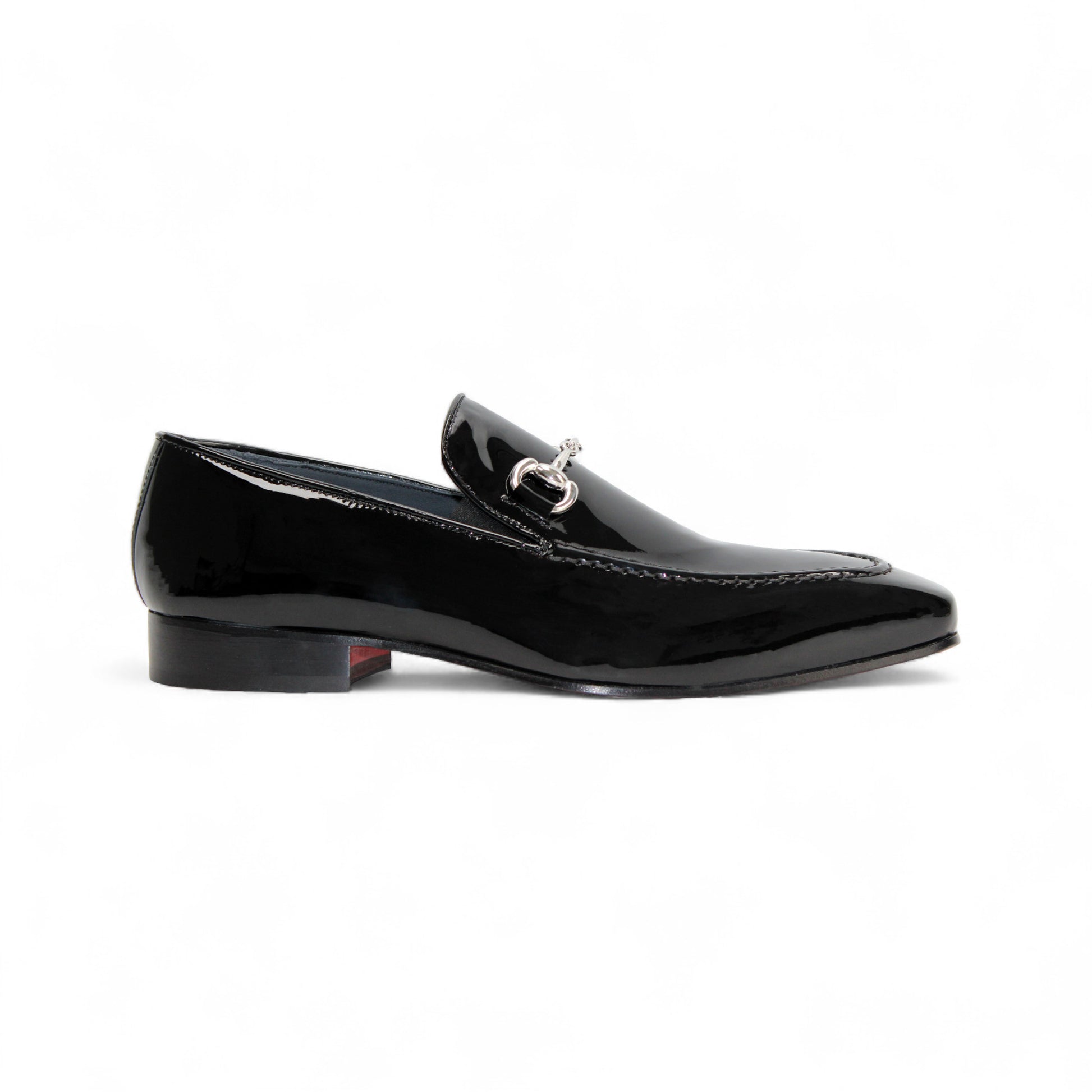 The Duca Di Matiste Duca Valenza Black is an Italian patent leather loafer with a low heel and metal horsebit detail, shown in side profile on a white background—an elegant, timeless designer shoe.