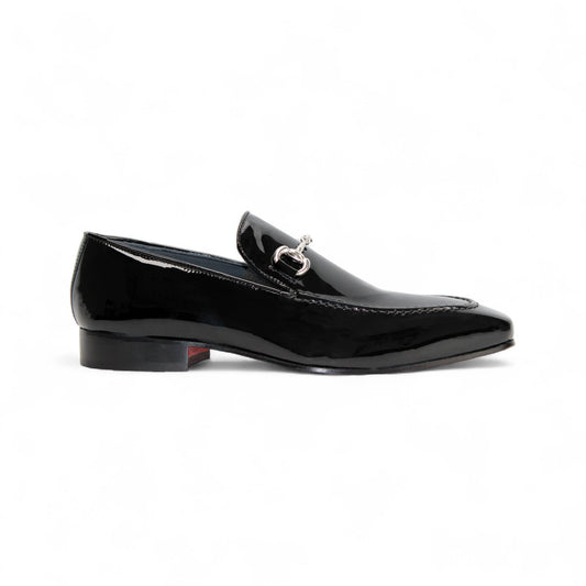 The Duca Di Matiste Duca Valenza Black is an Italian patent leather loafer with a low heel and metal horsebit detail, shown in side profile on a white background—an elegant, timeless designer shoe.