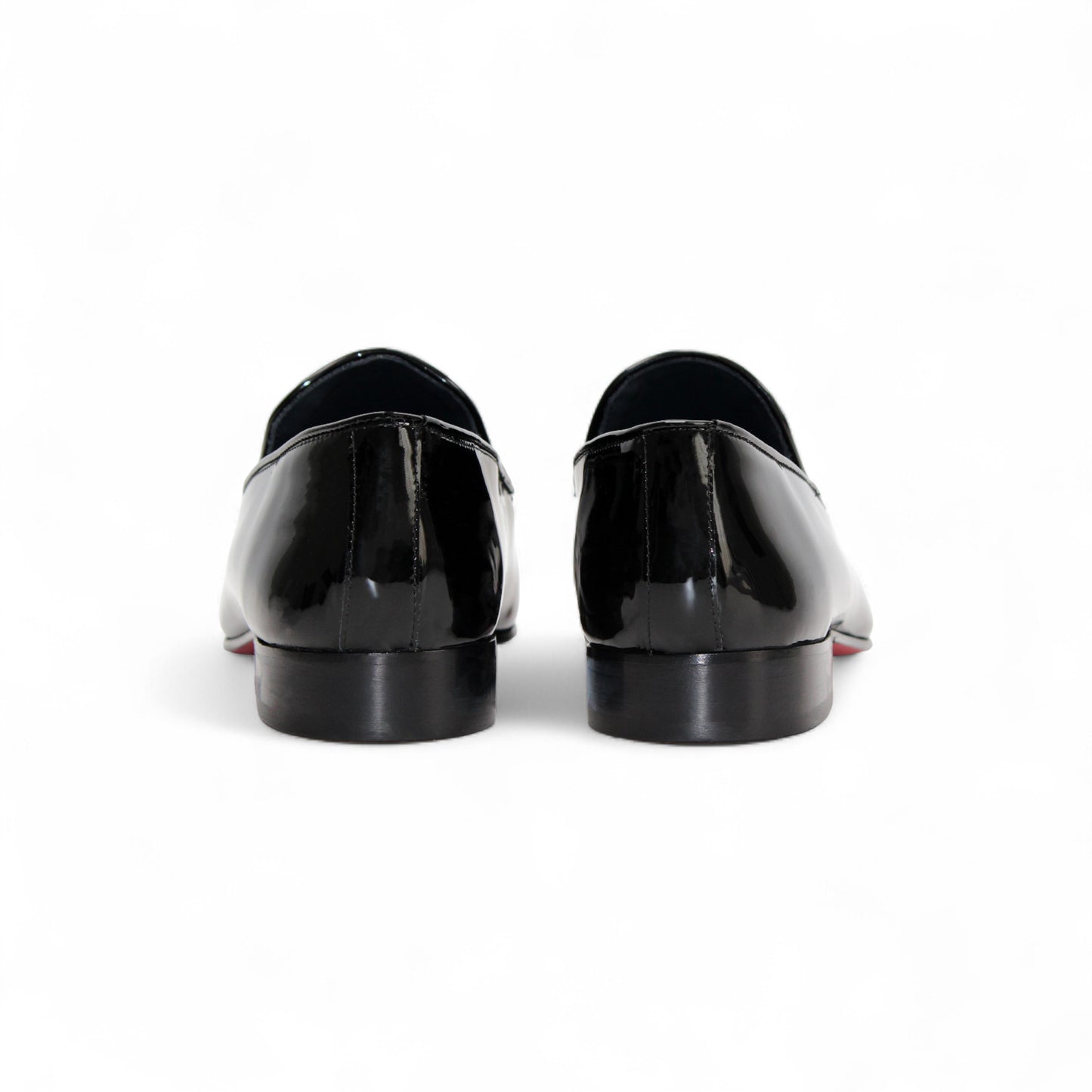 The Duca Di Matiste Duca Valenza Black is an Italian patent leather loafer with a low heel and metal horsebit detail, shown in side profile on a white background—an elegant, timeless designer shoe.