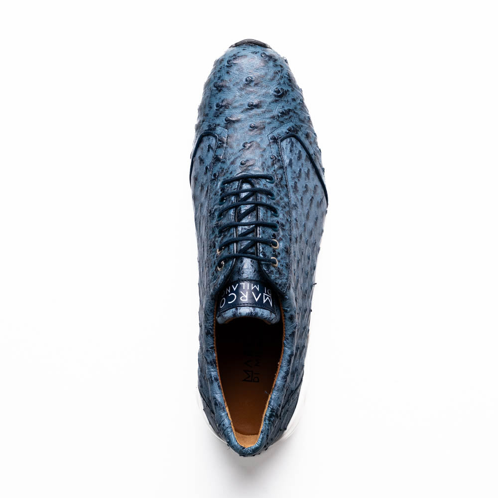 A pair of Marco Di Milano Varenna Blue Jeans sneakers—blue handcrafted leather with white soles and black laces—one upright, the other propped to display its sole.