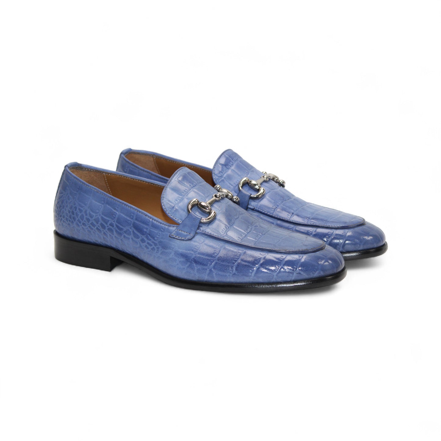 The Duca Vasto Light Blue by Duca Di Matiste is an Italian-crafted shoe in blue genuine croco-embossed leather with a silver metal buckle, shown in profile on a white background.
