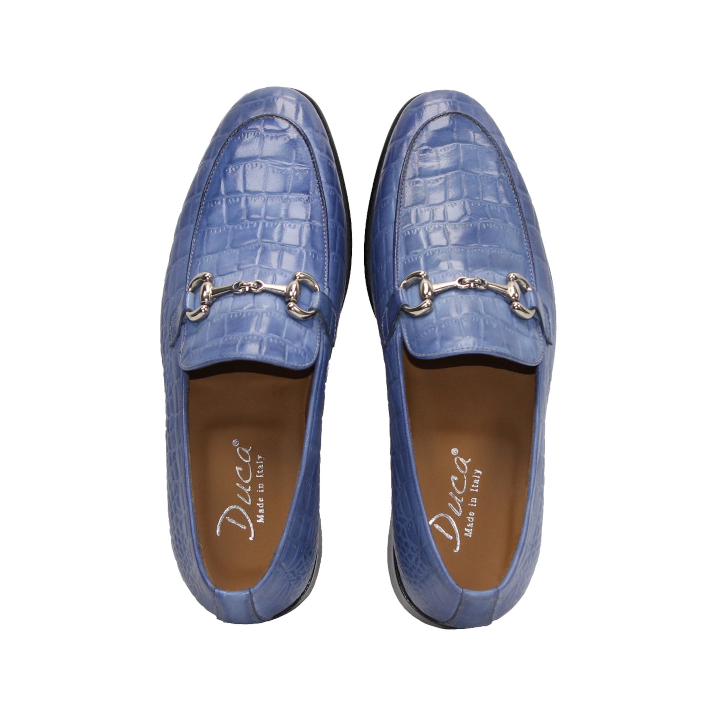 The Duca Vasto Light Blue by Duca Di Matiste is an Italian-crafted shoe in blue genuine croco-embossed leather with a silver metal buckle, shown in profile on a white background.