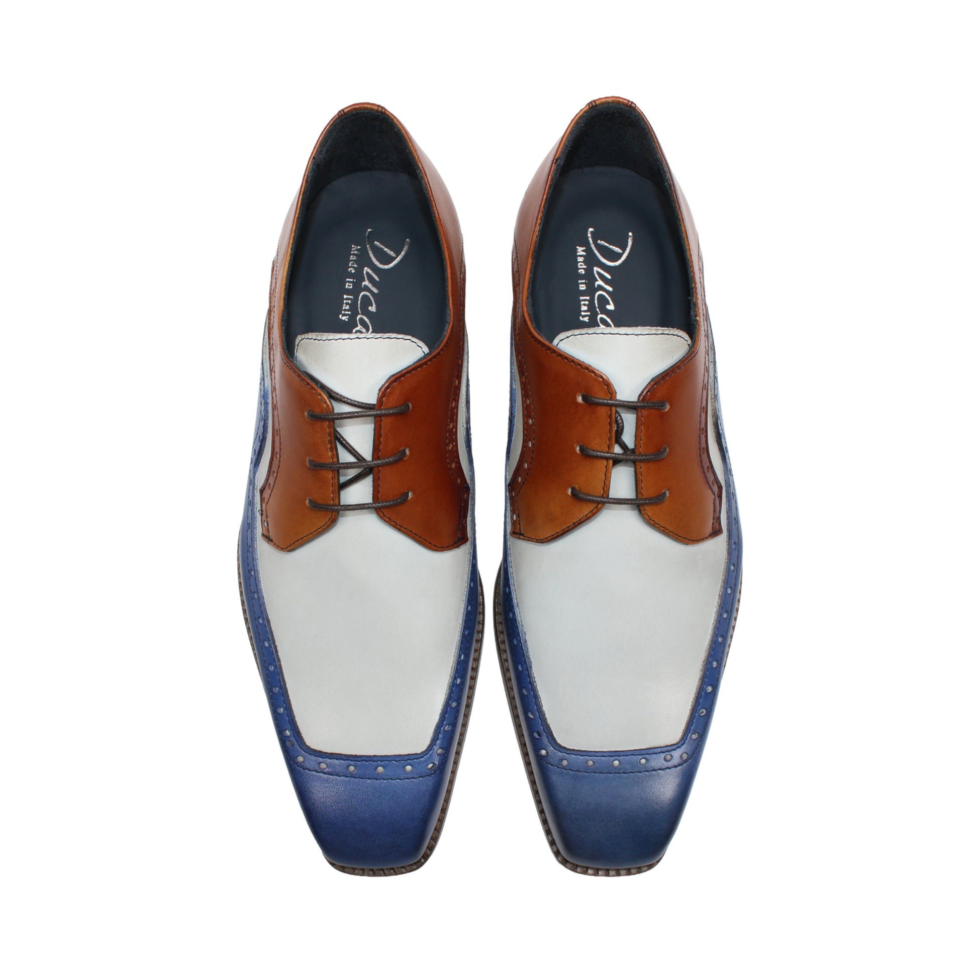 The Duca Di Matiste Duca Velletri Blue Combo is a calf leather dress shoe in brown, white, and blue with brogue detailing and a wooden sole, photographed from the side on a white background.