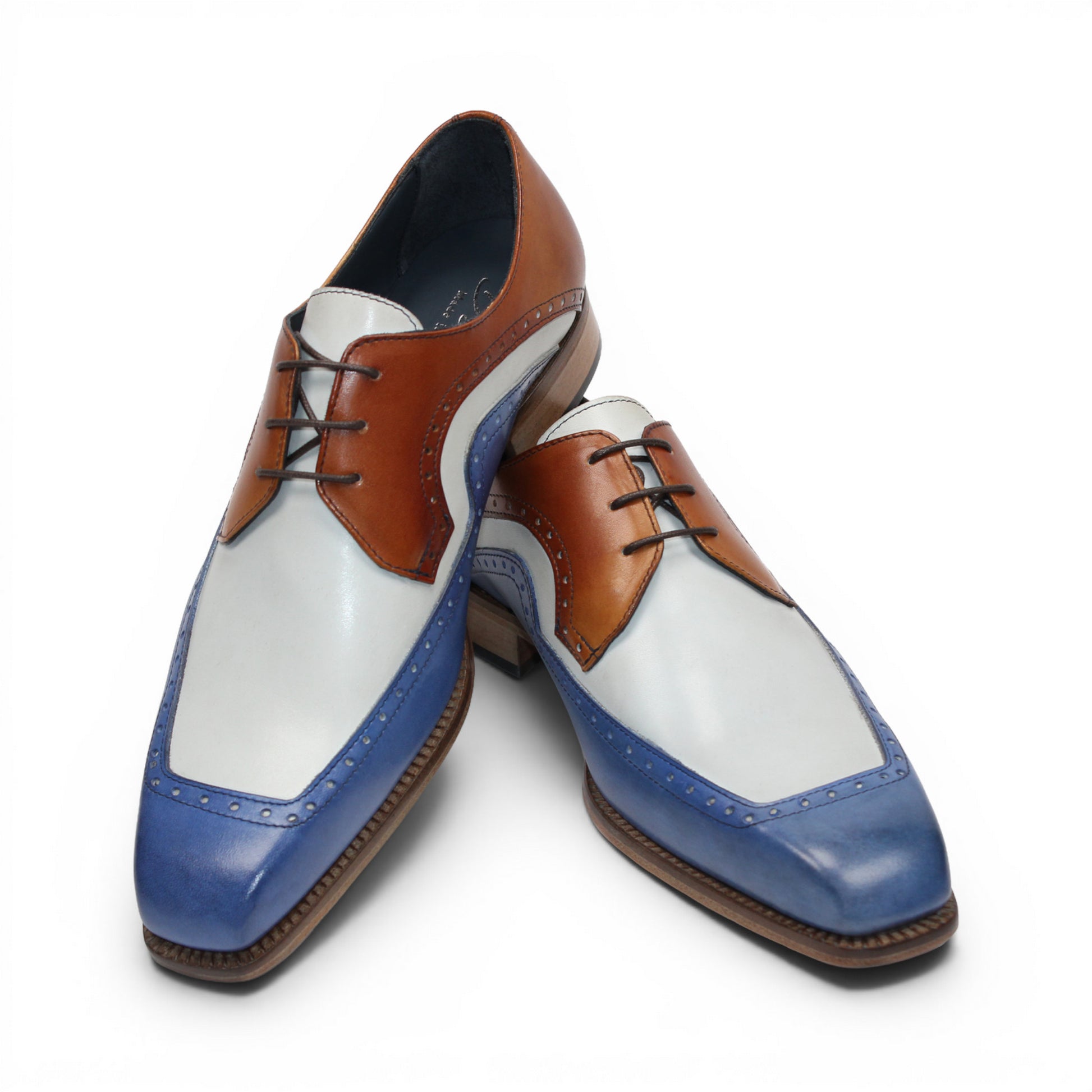 The Duca Di Matiste Duca Velletri Blue Combo is a calf leather dress shoe in brown, white, and blue with brogue detailing and a wooden sole, photographed from the side on a white background.