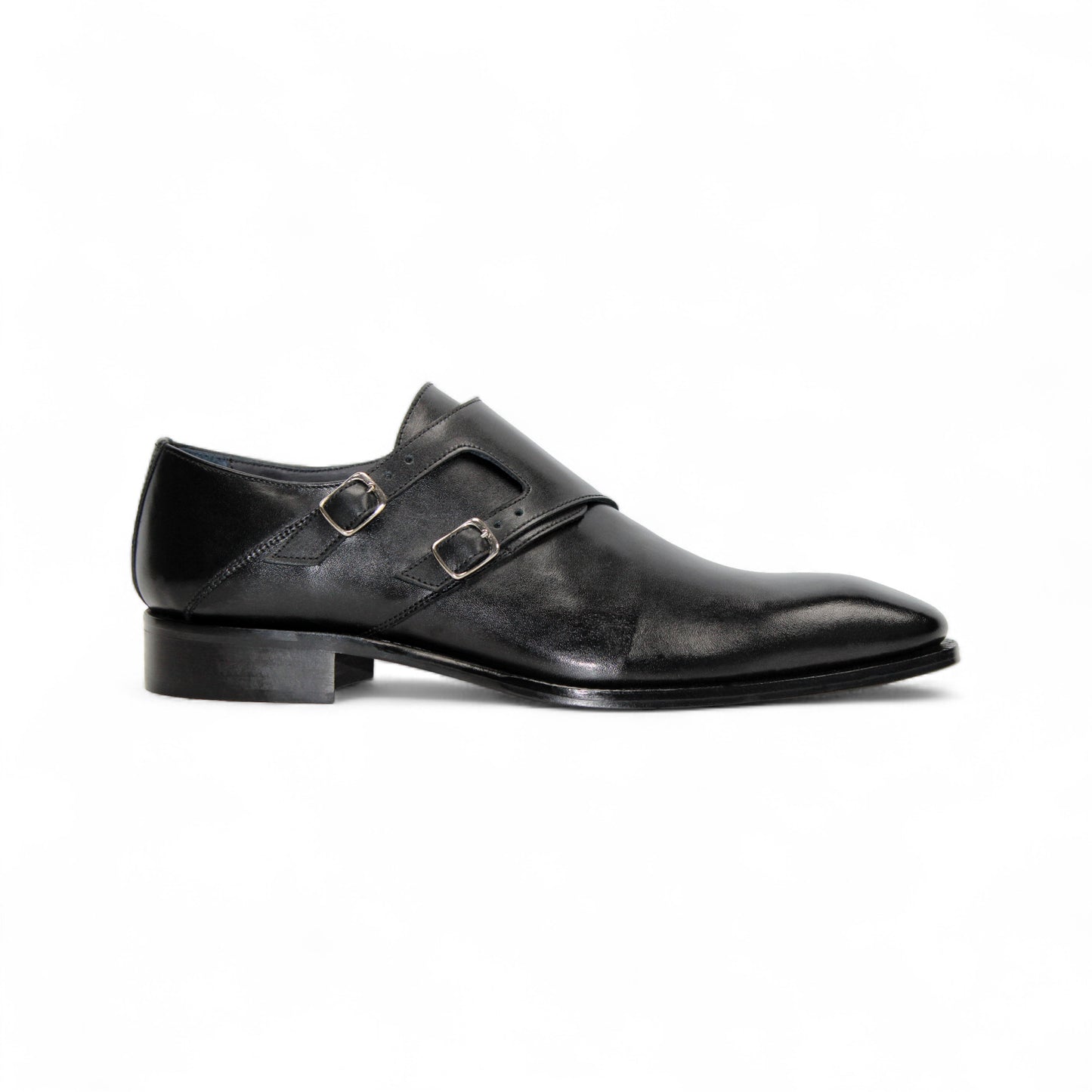 The Duca Vergato Black by Duca Di Matiste is an Italian leather double monk strap dress shoe with two buckles, a low heel, and almond toe, crafted from genuine leather and shown on a white background.