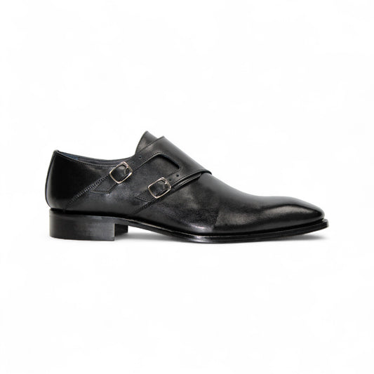 The Duca Vergato Black by Duca Di Matiste is an Italian leather double monk strap dress shoe with two buckles, a low heel, and almond toe, crafted from genuine leather and shown on a white background.
