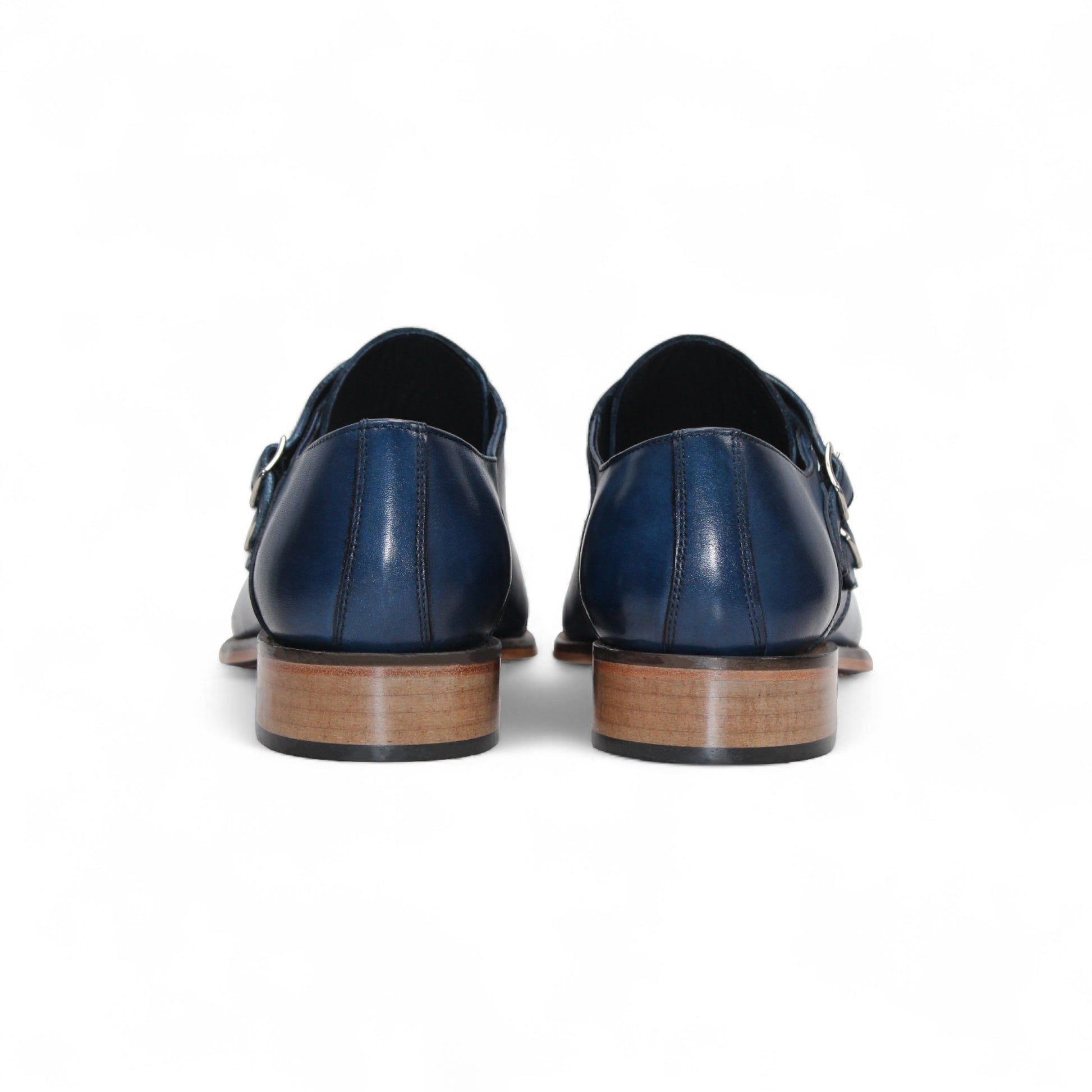 Duca Di Matiste's Duca Vergato Blue: men's blue leather double monk strap dress shoes with brogue detailing and a light brown stacked heel, shown on a white background.