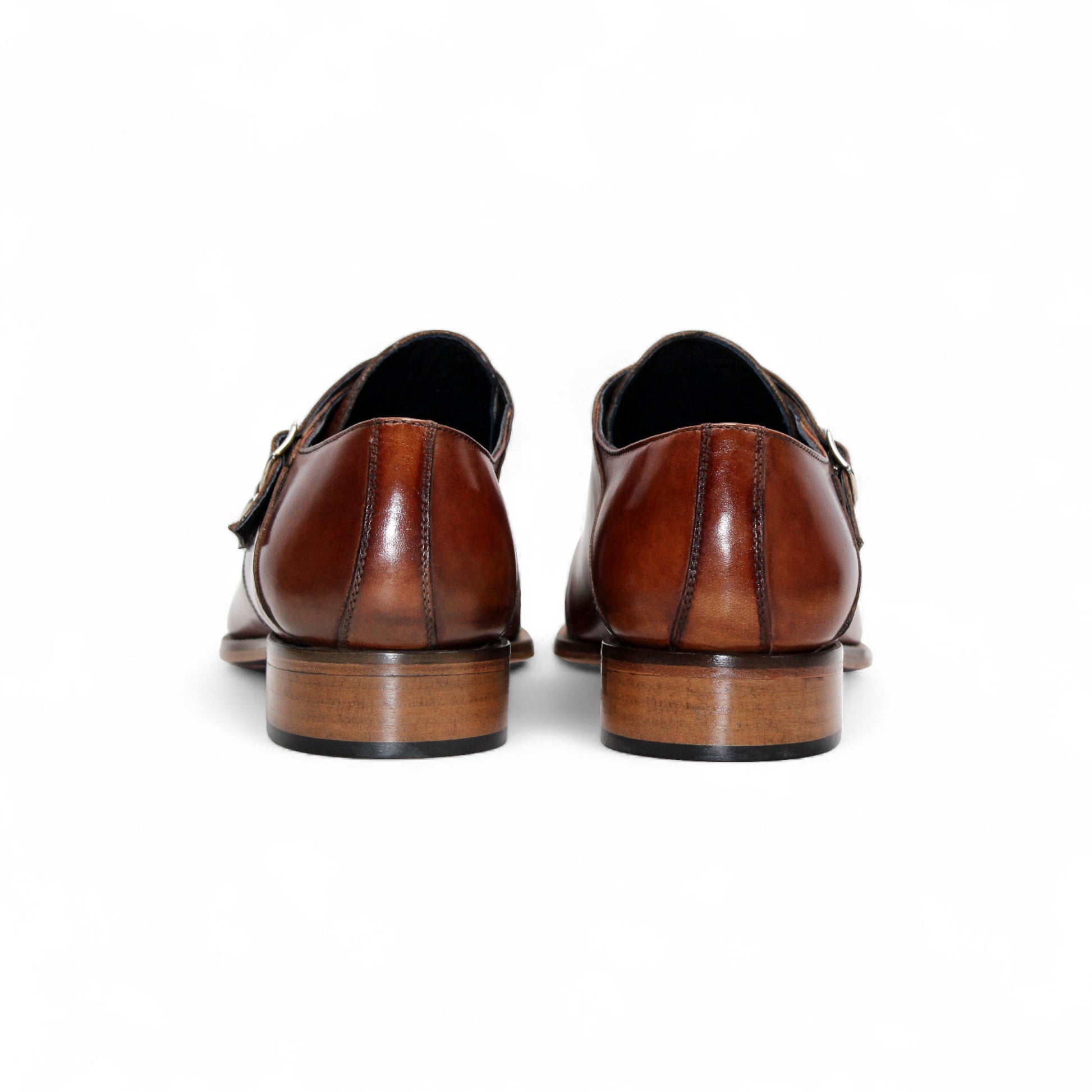 Duca Di Matiste's Duca Vergato Brandy: classic Italian double monk strap dress shoes in brown leather with a low wooden heel, decorative toe perforations, and a smooth polished finish—crafted for timeless style.