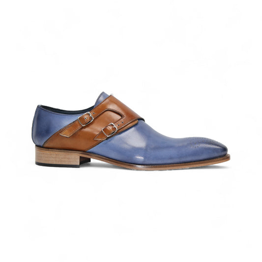 The Duca Di Matiste Duca Vergato Light Blue/Cognac is a premium blue leather dress shoe with brown double monk straps and a low wooden heel, shown in side profile on a white background.