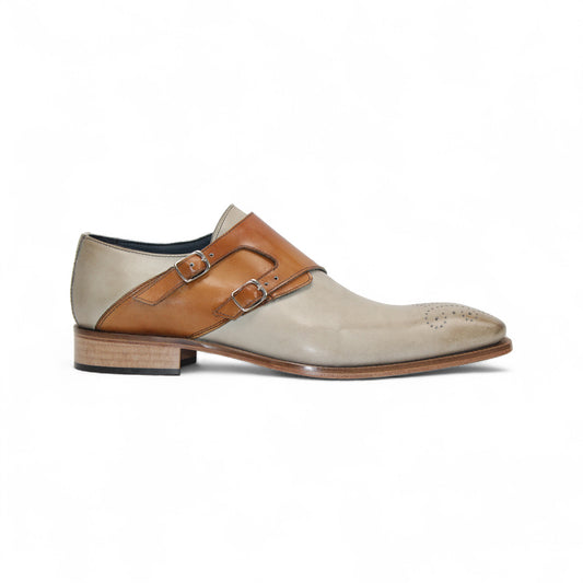 The Duca Di Matiste Duca Vergato Beige/Cognac is a genuine leather dress shoe with double monk straps, low wooden heel, and toe perforations, highlighting refined Italian style. Shown in profile on a white background.