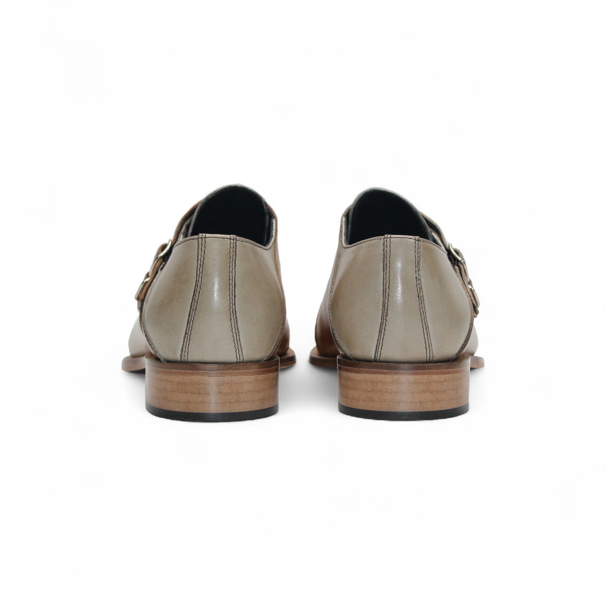 The Duca Di Matiste Duca Vergato Beige/Cognac is a genuine leather dress shoe with double monk straps, low wooden heel, and toe perforations, highlighting refined Italian style. Shown in profile on a white background.