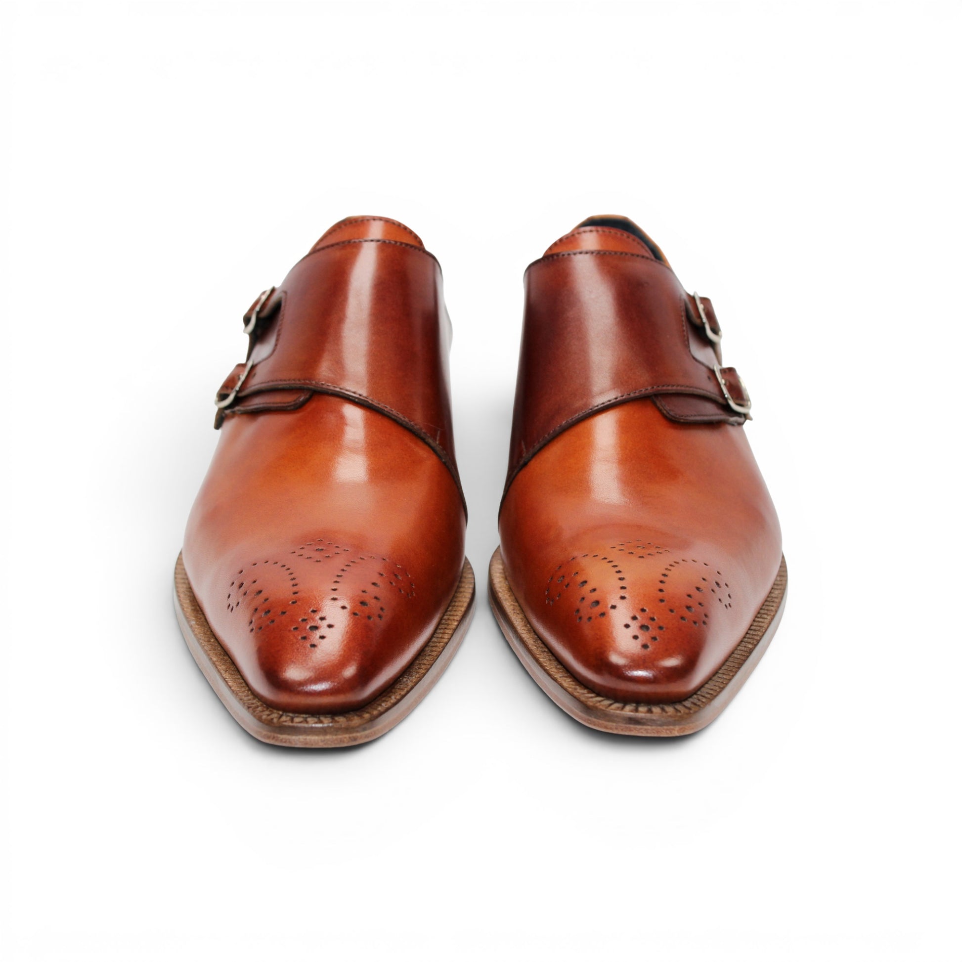 The Duca Vergato Gold/Brown by Duca Di Matiste is an Italian leather monk strap dress shoe in brown, featuring two buckles and decorative perforations on the toe, displayed on a white background.