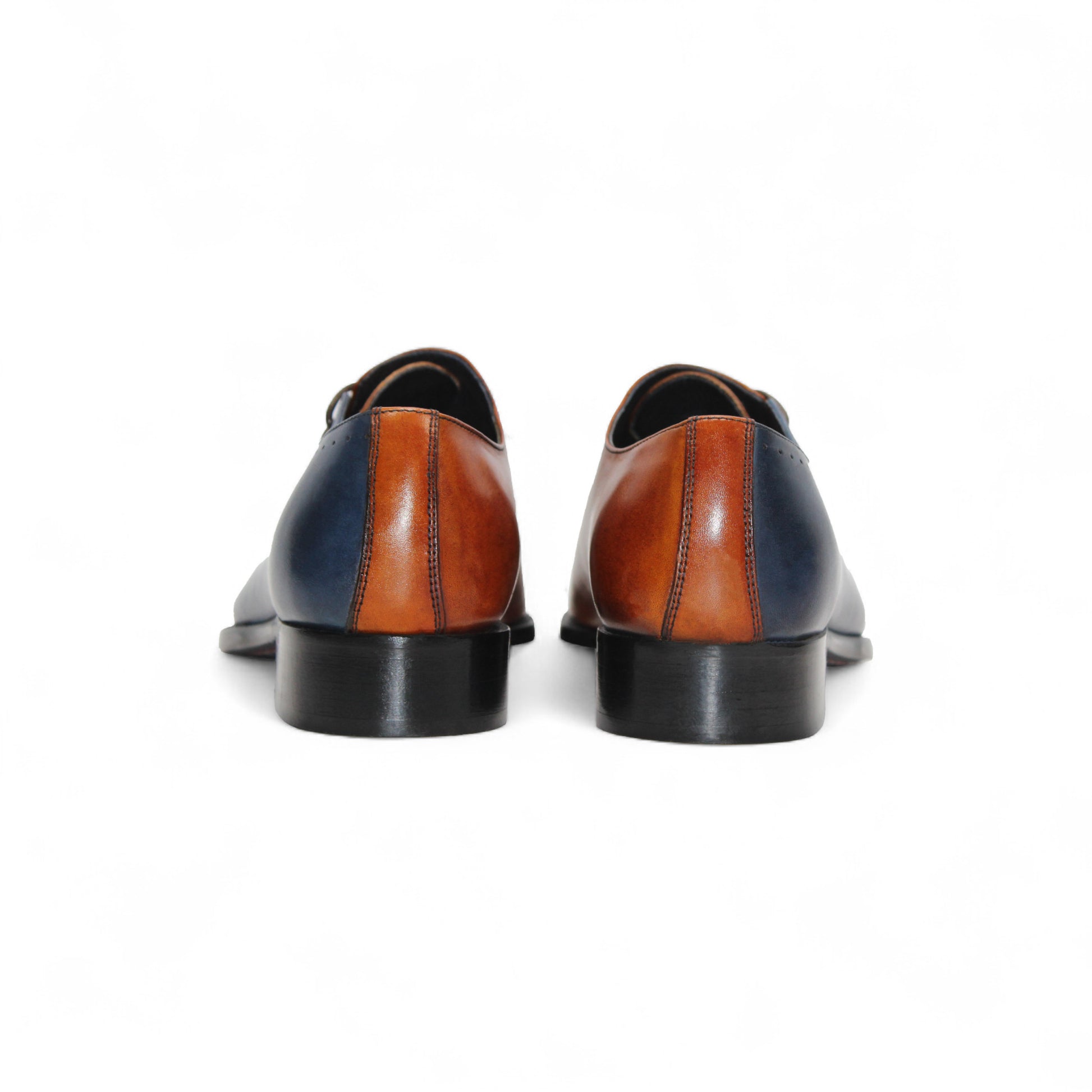 The Duca Di Matiste Duca Veroli Navy/Gold is a navy genuine leather oxford with black laces, a brown tongue, gold accents, and a low black heel, shown in a side view.