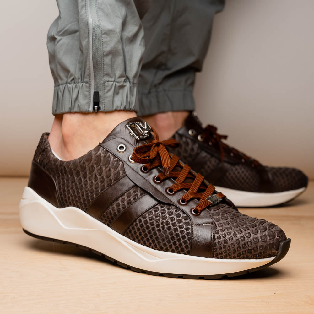 The Verona Brown sneakers by Marco Di Milano are luxury men's shoes crafted in brown sueded python with a snakeskin pattern, white soles, brown laces, and a metal tongue accent—perfect for standout style.