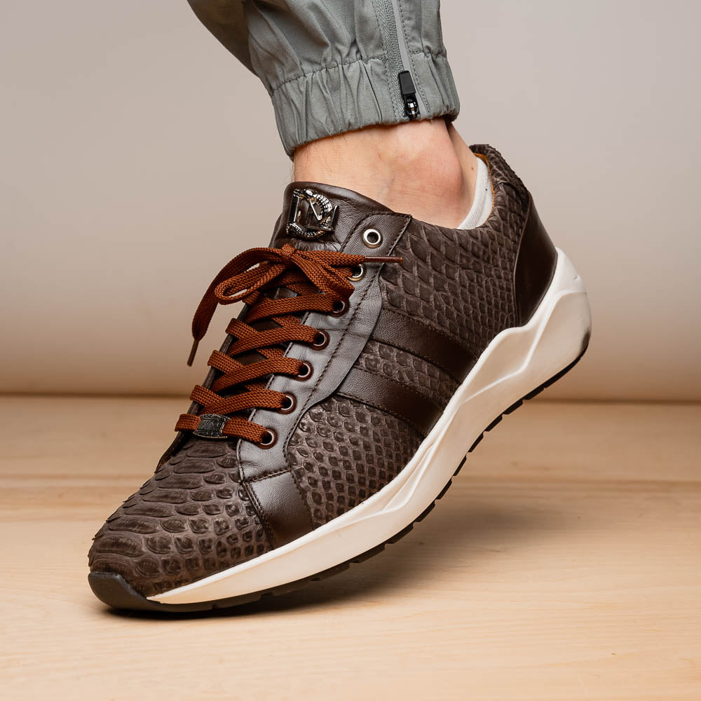 The Verona Brown sneakers by Marco Di Milano are luxury men's shoes crafted in brown sueded python with a snakeskin pattern, white soles, brown laces, and a metal tongue accent—perfect for standout style.