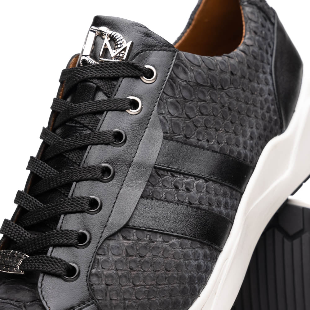 The Verona Black sneakers by Marco Di Milano feature a black textured design, white soles, black laces, and dual black side stripes; one shoe stands upright, while the other lies on its side displaying the sole.
