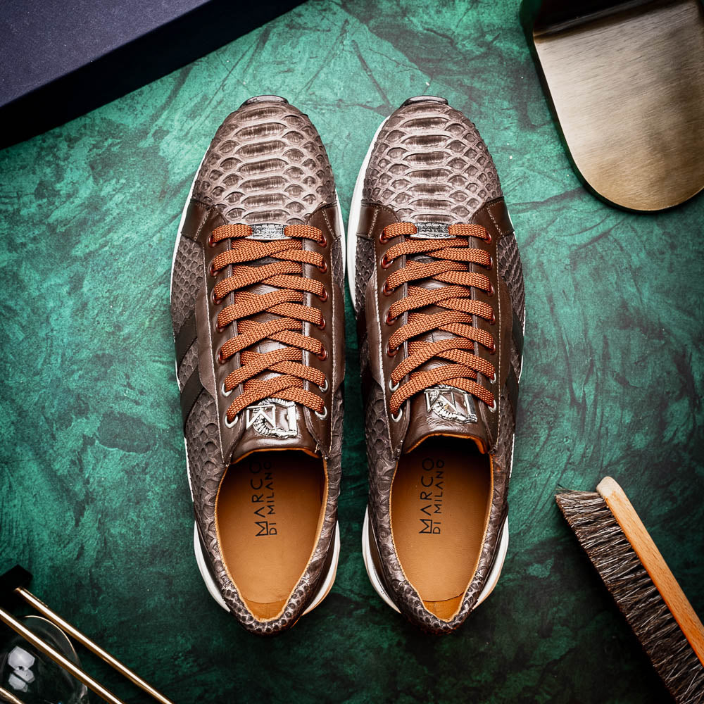 The Verona Brown sneakers by Marco Di Milano are luxury men's shoes crafted in brown sueded python with a snakeskin pattern, white soles, brown laces, and a metal tongue accent—perfect for standout style.