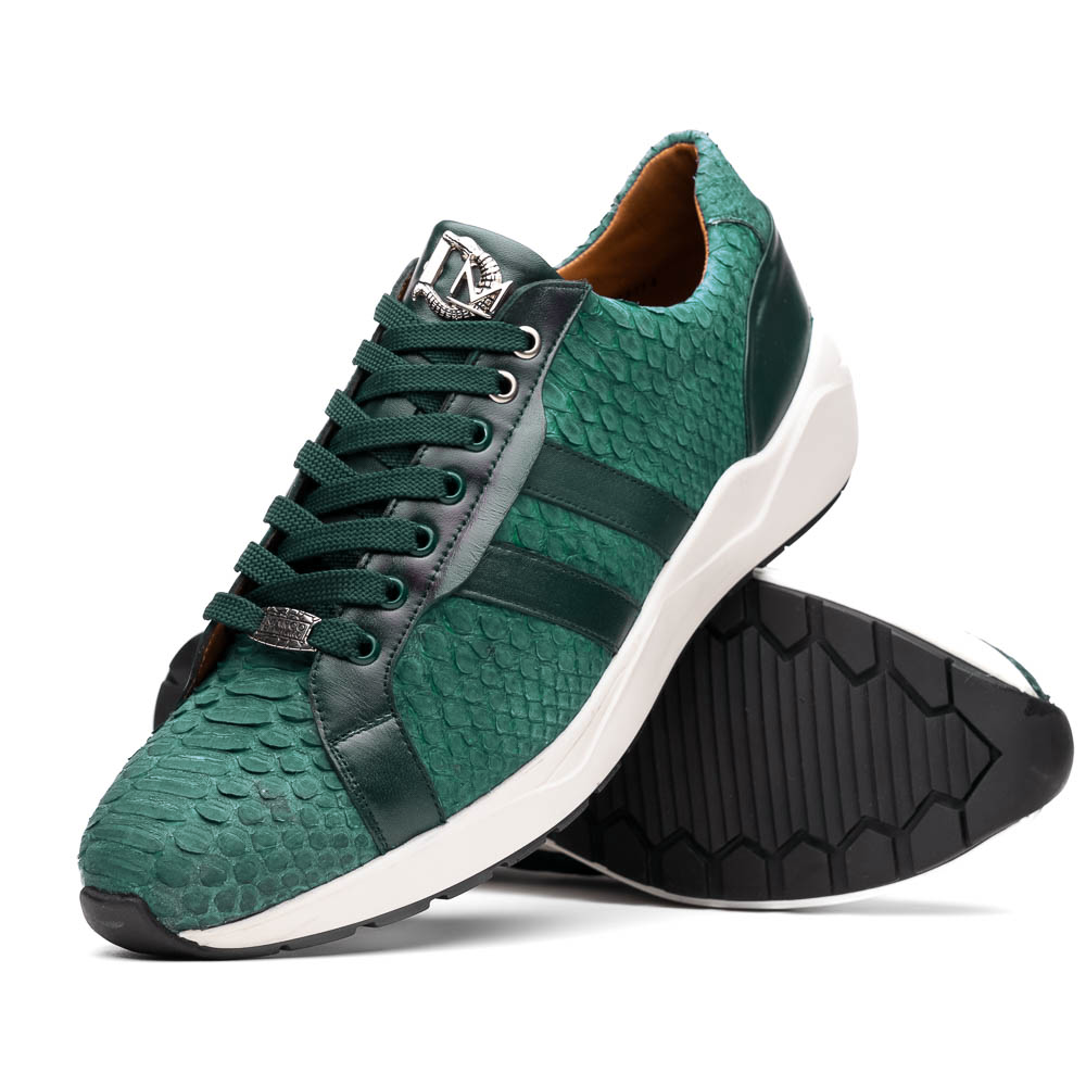 The Marco Di Milano Verona Green sneakers are luxury shoes with scale-like patterns, dark green accents, and white soles. One shoe is upright while the other lies on its side.