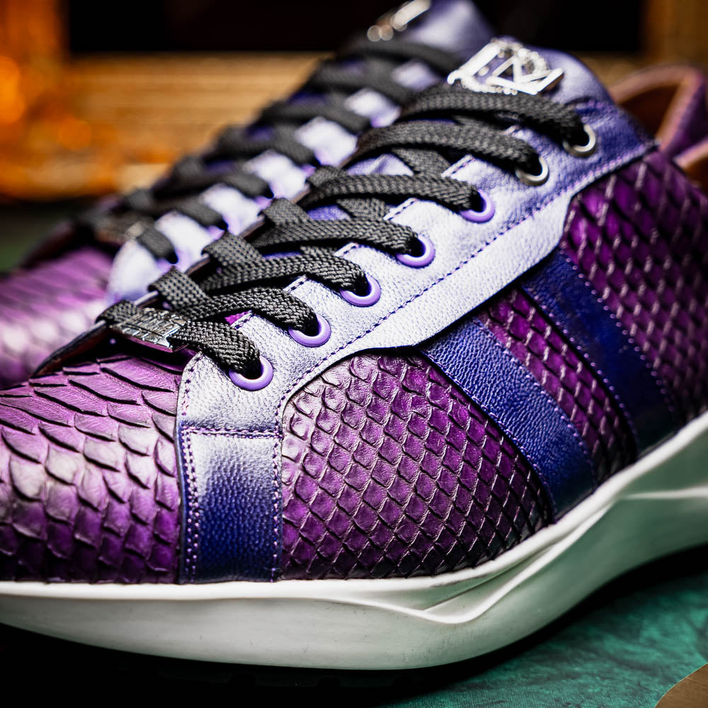 The Verona Purple by Marco Di Milano are hand-painted python sneakers with a textured scale pattern, black laces, and white soles—ideal for elevating any men's sneaker collection. One shoe stands while the other lies on its side.